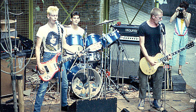 image of the Neurotics playing in the courtyard of a London housing estate - Photo by John Mortimer